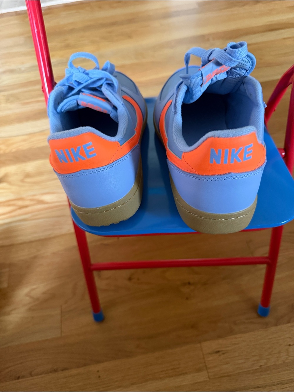 Nike Light Blue and Orange Athletic Shoes with Gold Accents - Picture 3 of 7